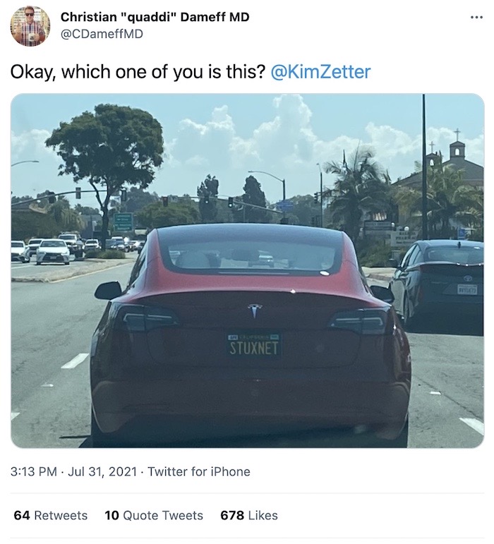 A license plate on a Tesla that reads "STUXNET"