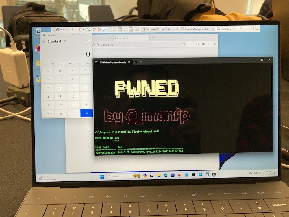 A screenshot showing a Windows computer with the Calculator app open — often the app used to demonstrate an exploit has succeeded by showing a benign/safe app — followed by a terminal screen that shows the words, "PWNED," signifying an exploit has been carried out on this machine. 