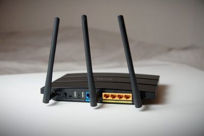 a photo of the back of a TP-Link wireless router