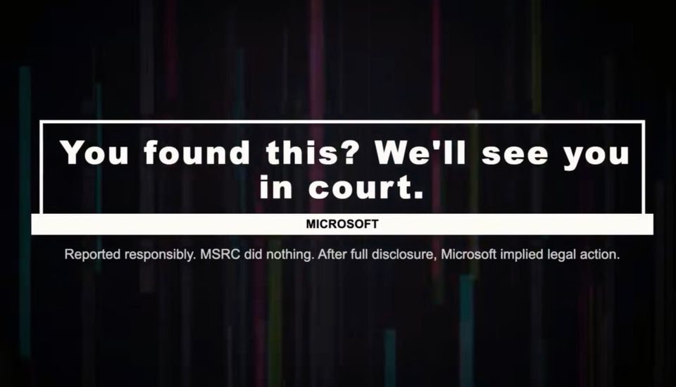 a screenshot from the Pwnie Awards live stream, which reads: "You found this? We'll see you in court," naming Microsoft.