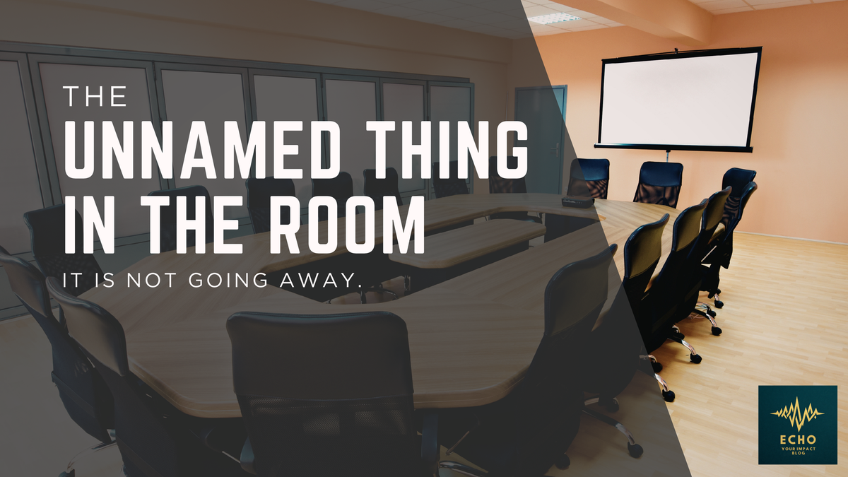 The Unnamed Thing in the Room Is Not Going Away. It Is Just Getting Heavier.