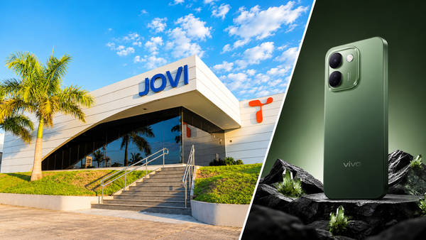 Fachada da fábrica da Jovi em Manaus ao lado de um smartphone verde da marca Vivo posicionado sobre pedras.