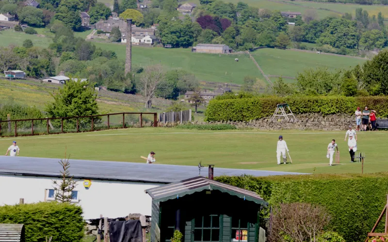 Haworth Cricket Club: A scenic postage stamp