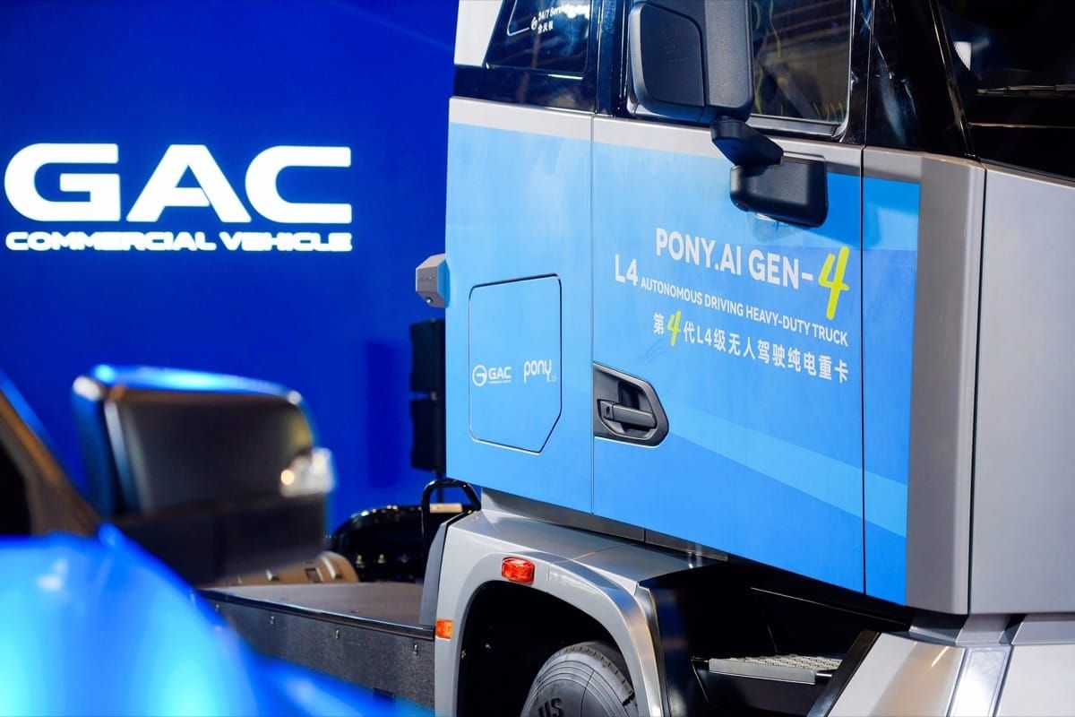 Cab of the T9 Robotruck, marked Pony.ai Gen-4 L4 autonomous heavy-duty truck, beside a GAC Commercial Vehicle sign.