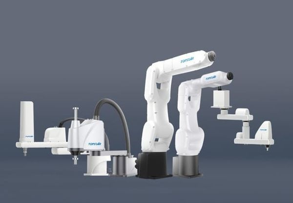 Topstar's SCARA and six-axis industrial robots, white arms with the Topstar logo, shown against a dark gray studio background