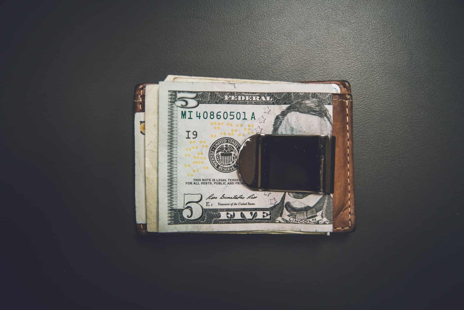 Paper money in a bill fold.