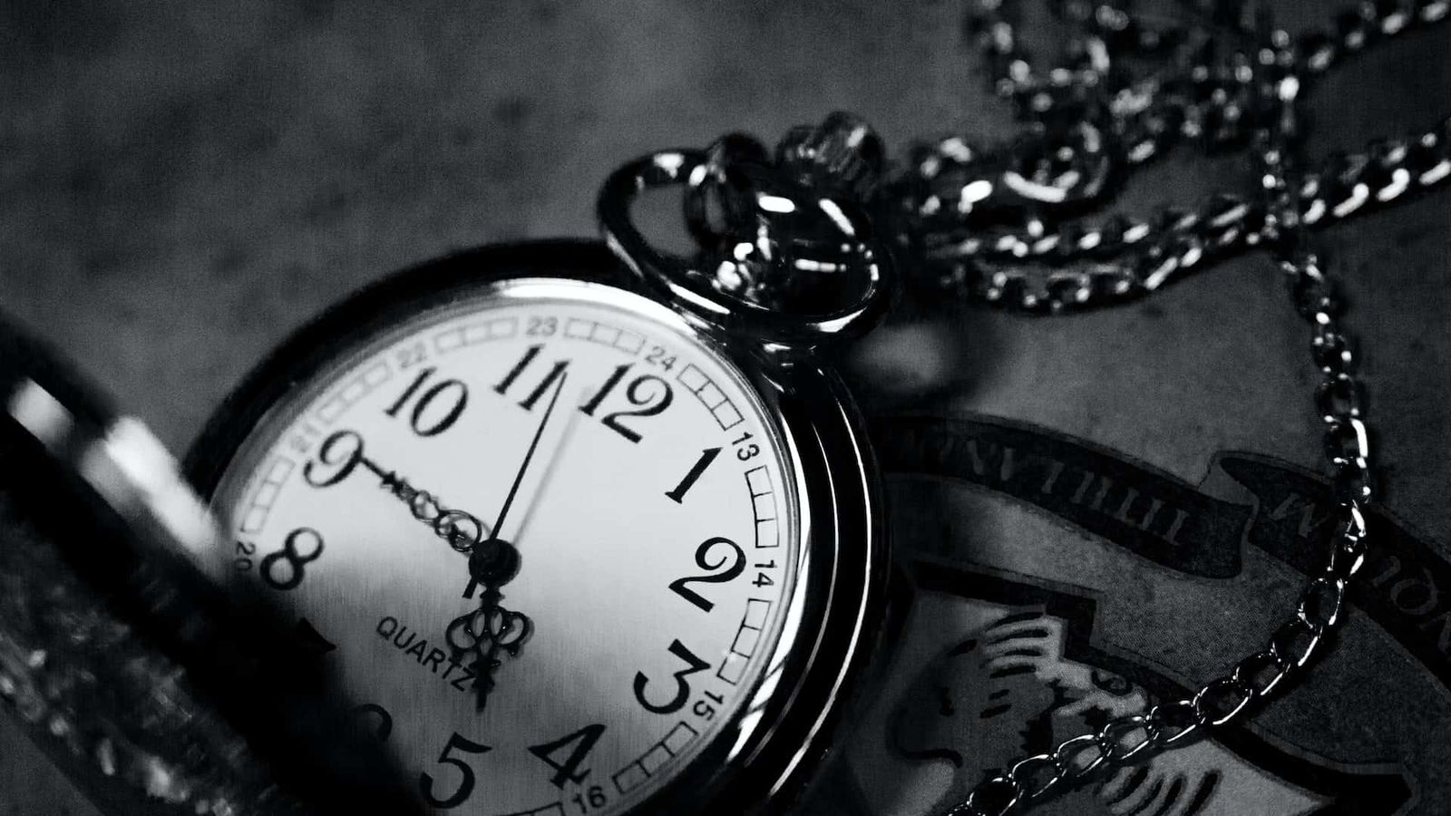 A Quartz pocket watch showing the time 4:45