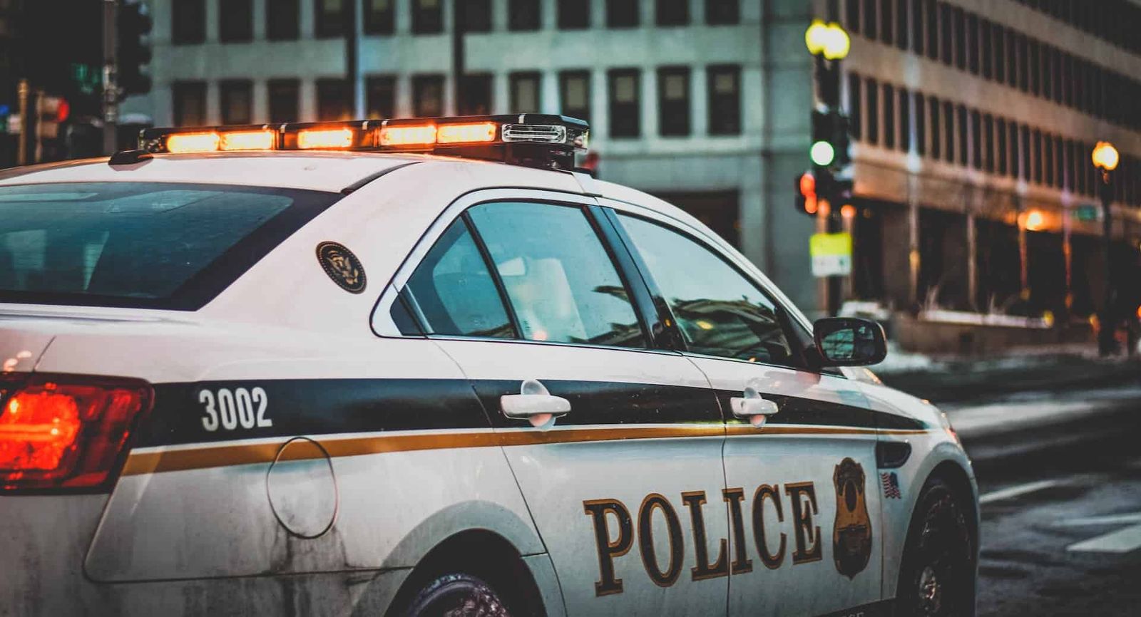 Image of a police car on a city street