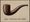 Magritte's surrealist painting of a brown smoking pipe rendered in precise detail against a beige background, with the French caption "Ceci n'est pas une pipe"—"This is not a pipe."