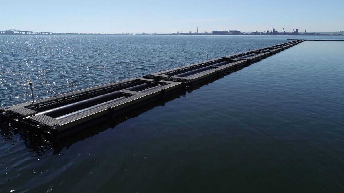 MOORING EFFECTS ON FLOATING BREAKWATER DYNAMICS UNDER BREAKING WAVES