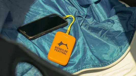 Festival goer at a Volt point