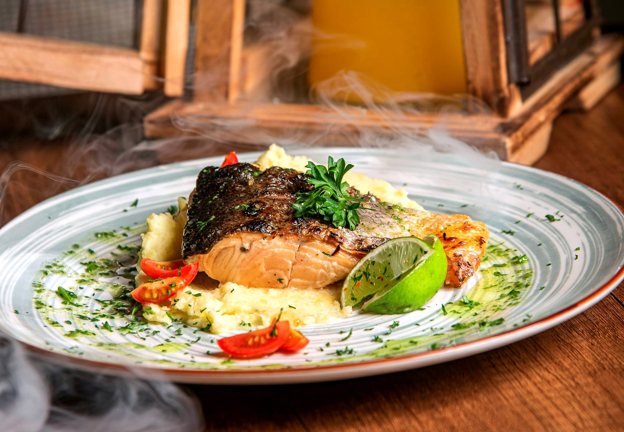 Broiled salmon on ceramic plate