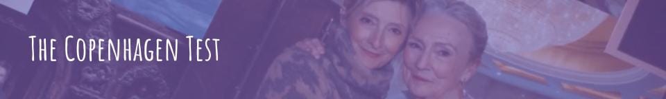 Lesbian couple in The Copenhagen Test - Orphenage director and her wife