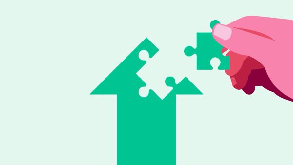 화살표 모양의 퍼즐 그림의 마지막 조각을 맞추는 모습