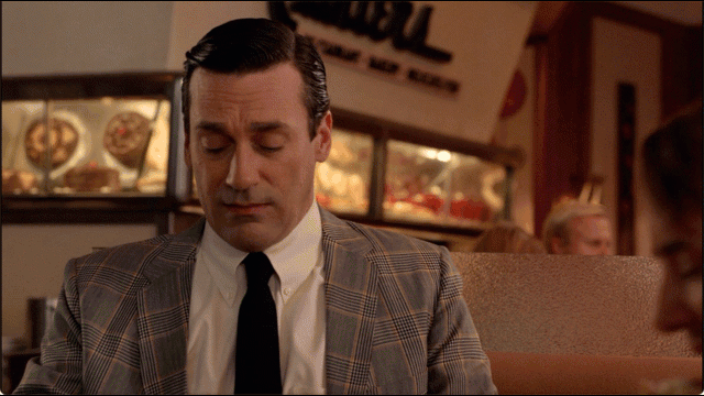 Don Draper and Pete Campbell eating a Brooklyn Ave sandwich.