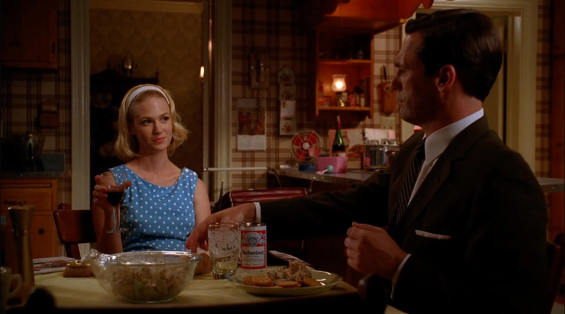 Don and Betty sitting at a table eating chicken salad and Ritz crackers.