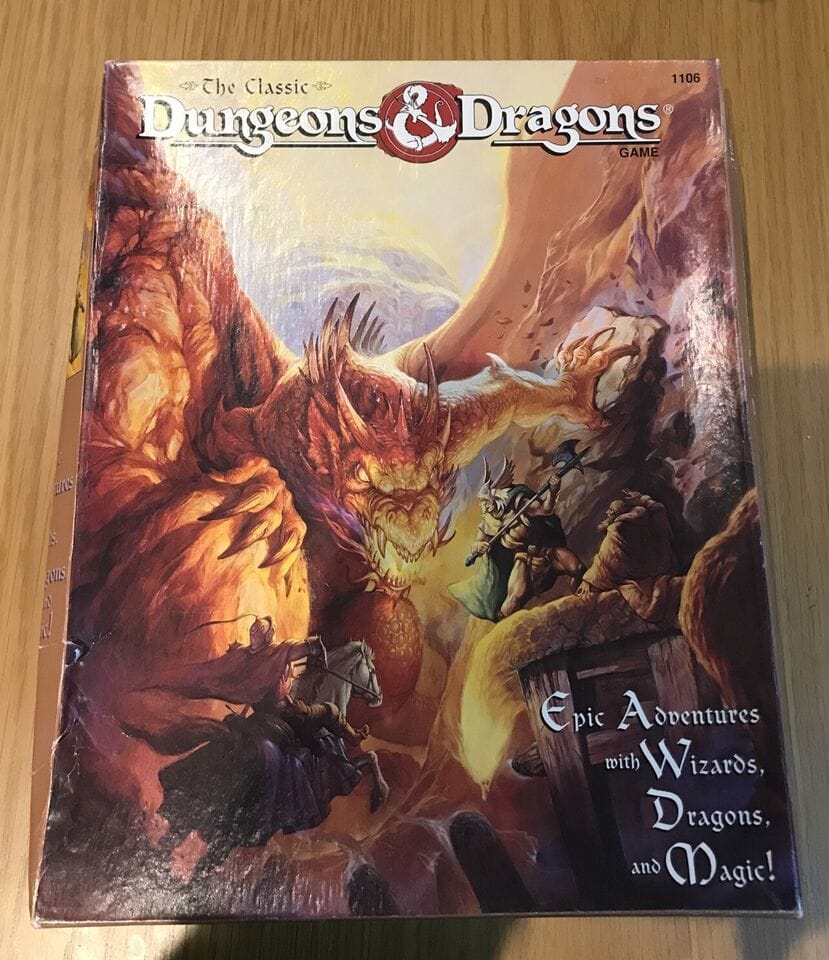 A photo of The Classic Dungeons & Dragons Game box. Text reads "Epic Adventures with Wizards, Dragons, and Magic!" Gotta respect the Oxford comma usage.