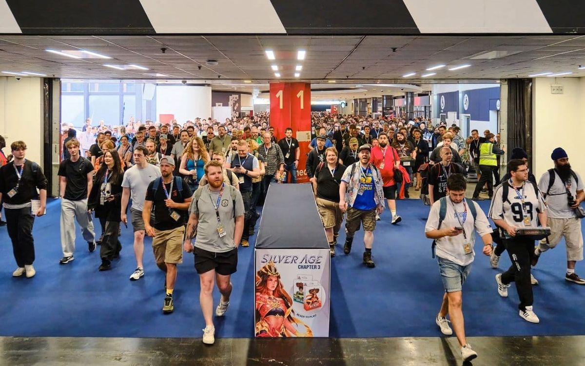 A crowd of participants entering the UK Games Expo convention.