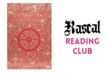 the cover of Burning Wheel RPG which is red and gold with a wheel in the centre