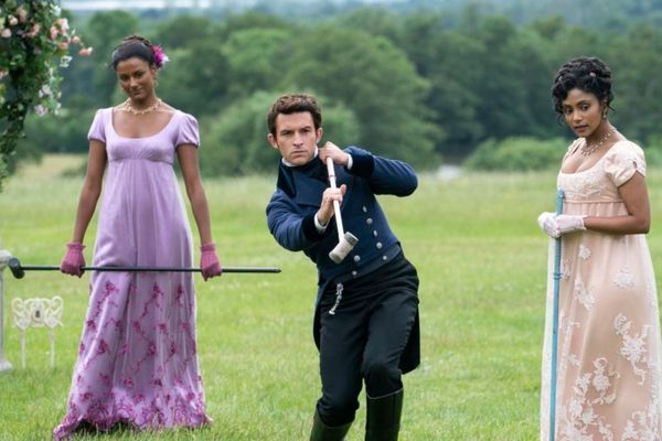 The guy from Bridgerton season 2 swinging some croquet hammer. The two Sharma sisters look o