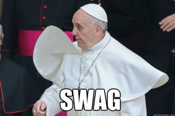 A picture of Pope Francis subtitled SWAG.