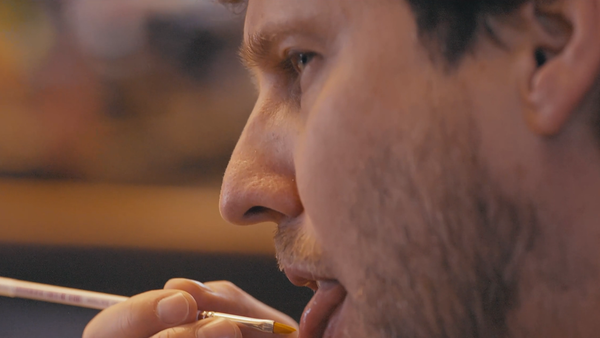 Jon Heder licking a paintbrush. A Heder header, if you will.