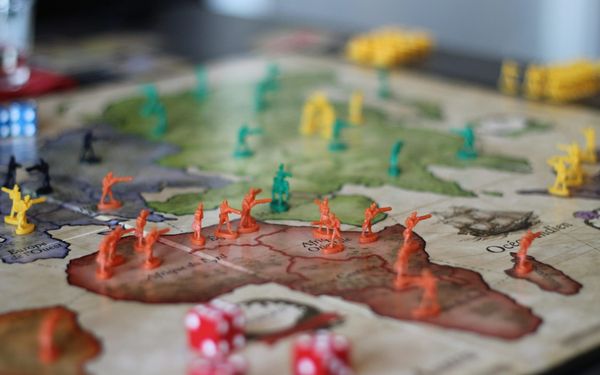 Miniatures and dice on a map