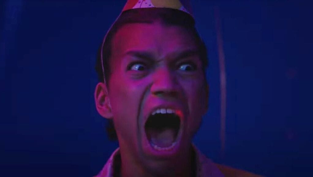 Justice Smith in I Saw the TV Glow screaming in horror