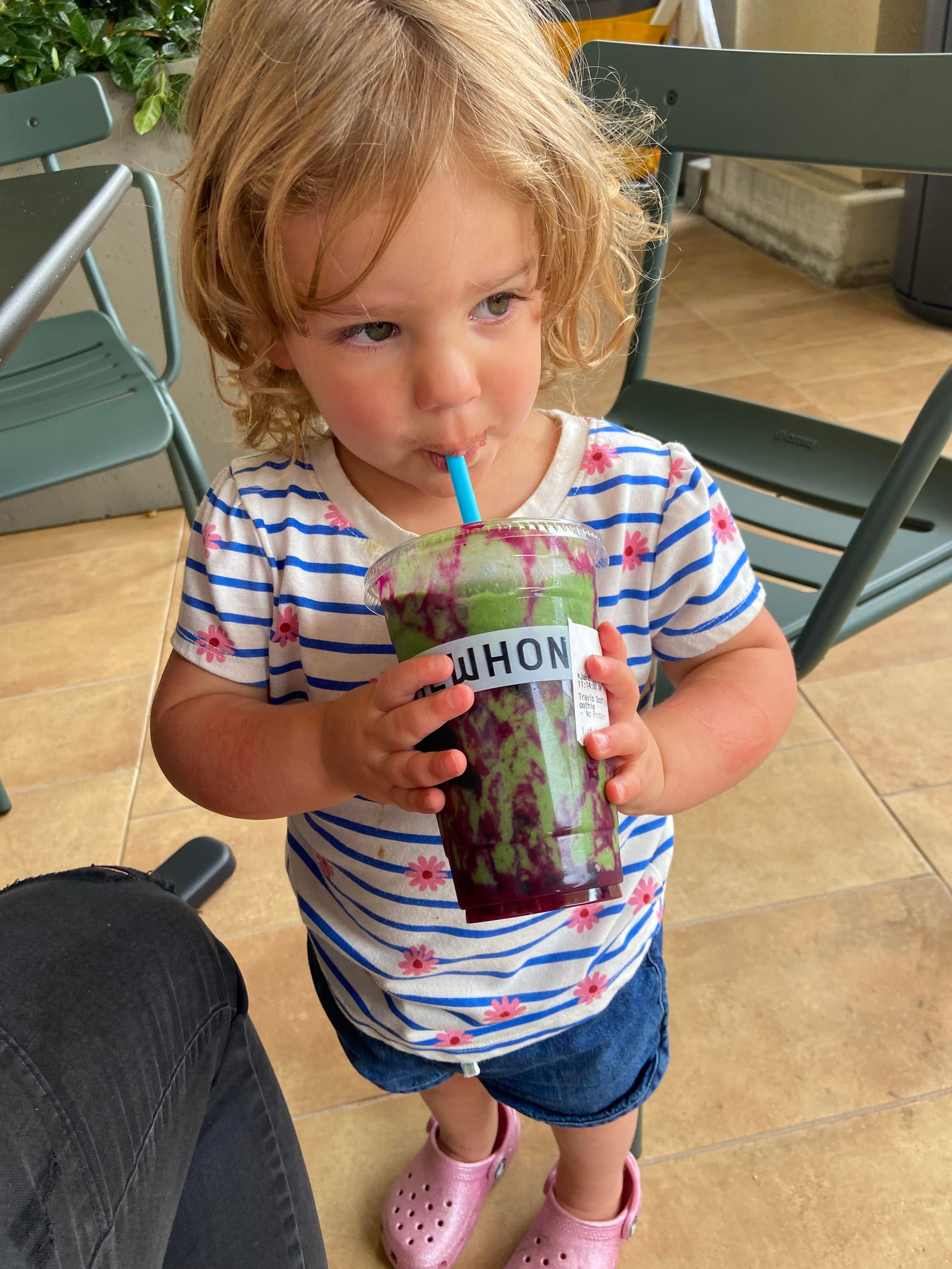 Toddler drinking smootie