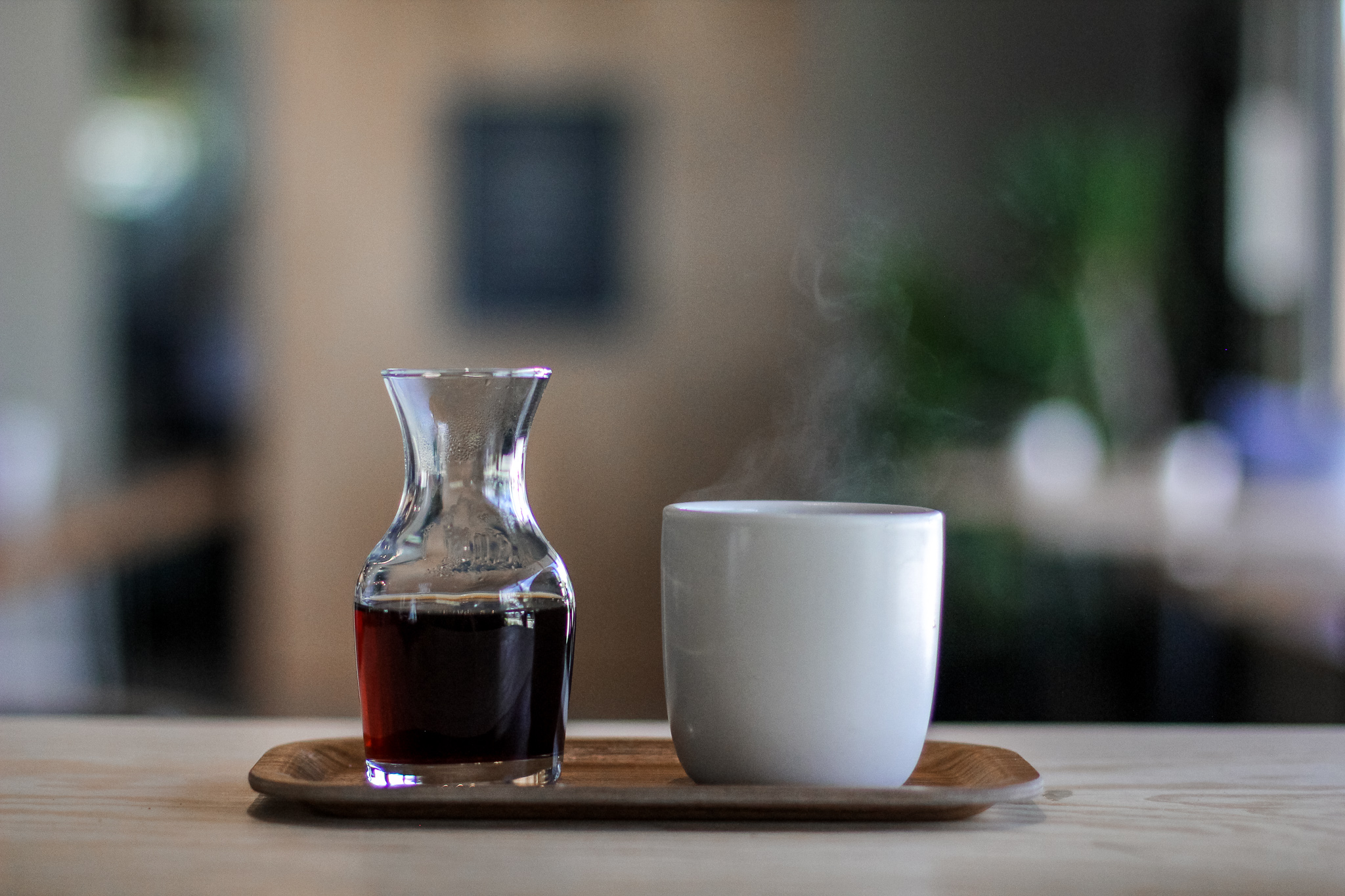 Finished pour-over coffee with Wells Coffee Co branding