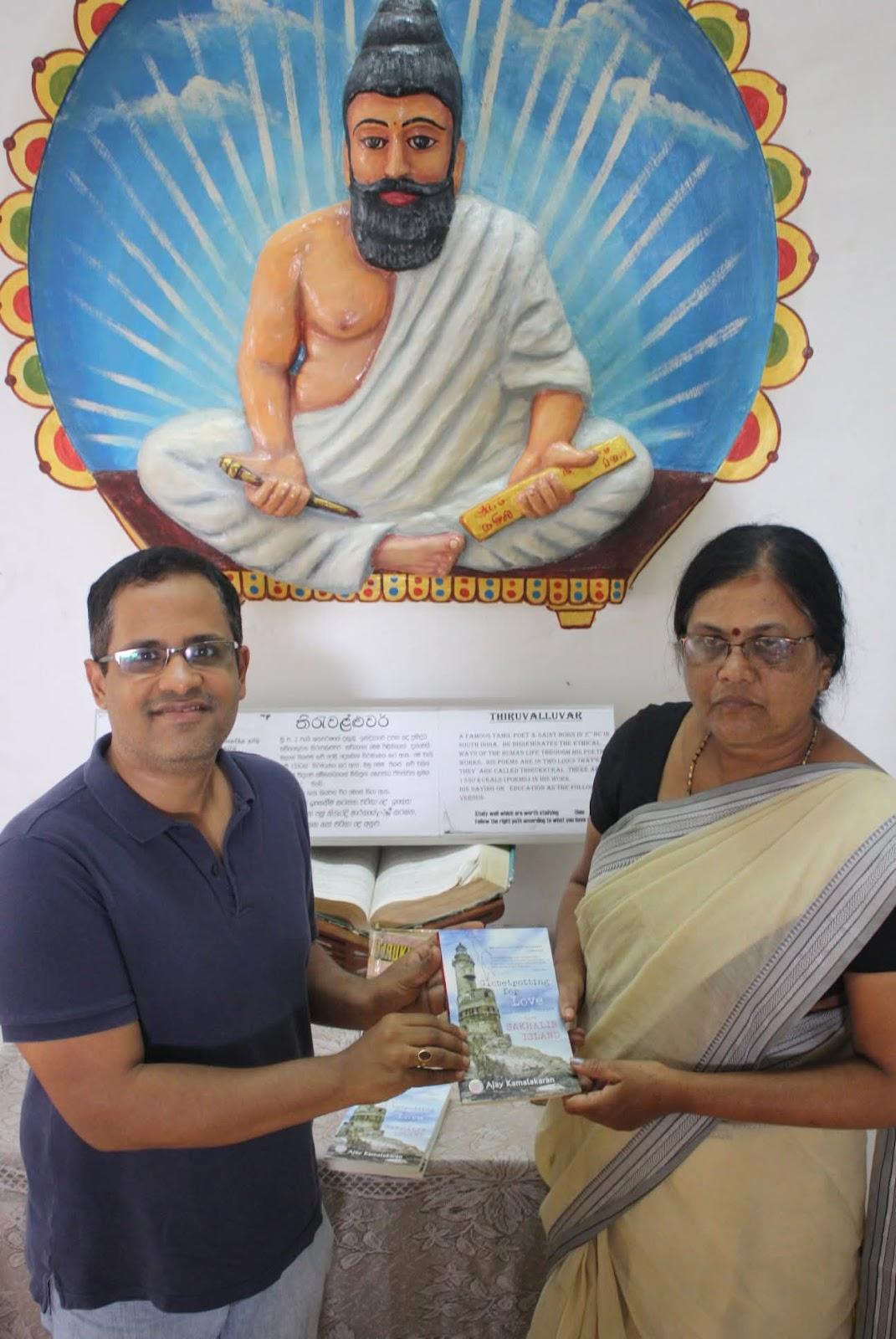 Ajay Kamalakaran at the Jaffna Public Library, donating a copy of his book