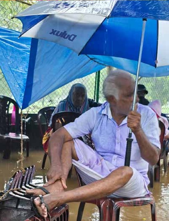 Displaced Tamil residents of Valikamam North protest in heavy rain outside the Sri Lanka Army’s Commando bungalow in Jaffna, demanding the return of ancestral lands they say have remained under military occupation since their forced displacement in 1990.