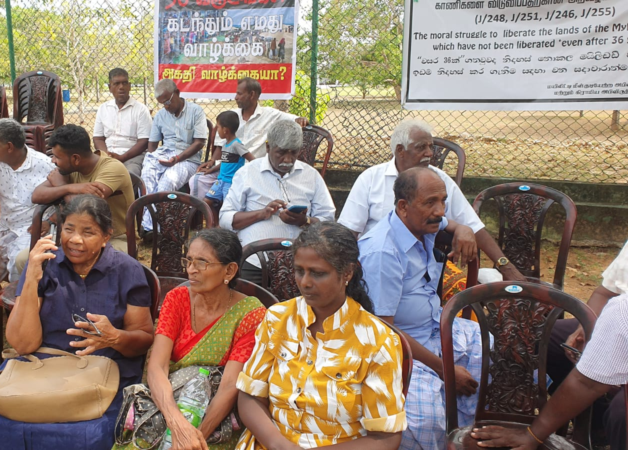 Displaced Tamil landowners protest outside the gates of the military’s Commando bungalow in Valikamam North, built on land taken from local Tamil families, as they demand the return of ancestral properties they have been denied access to for nearly 36 years