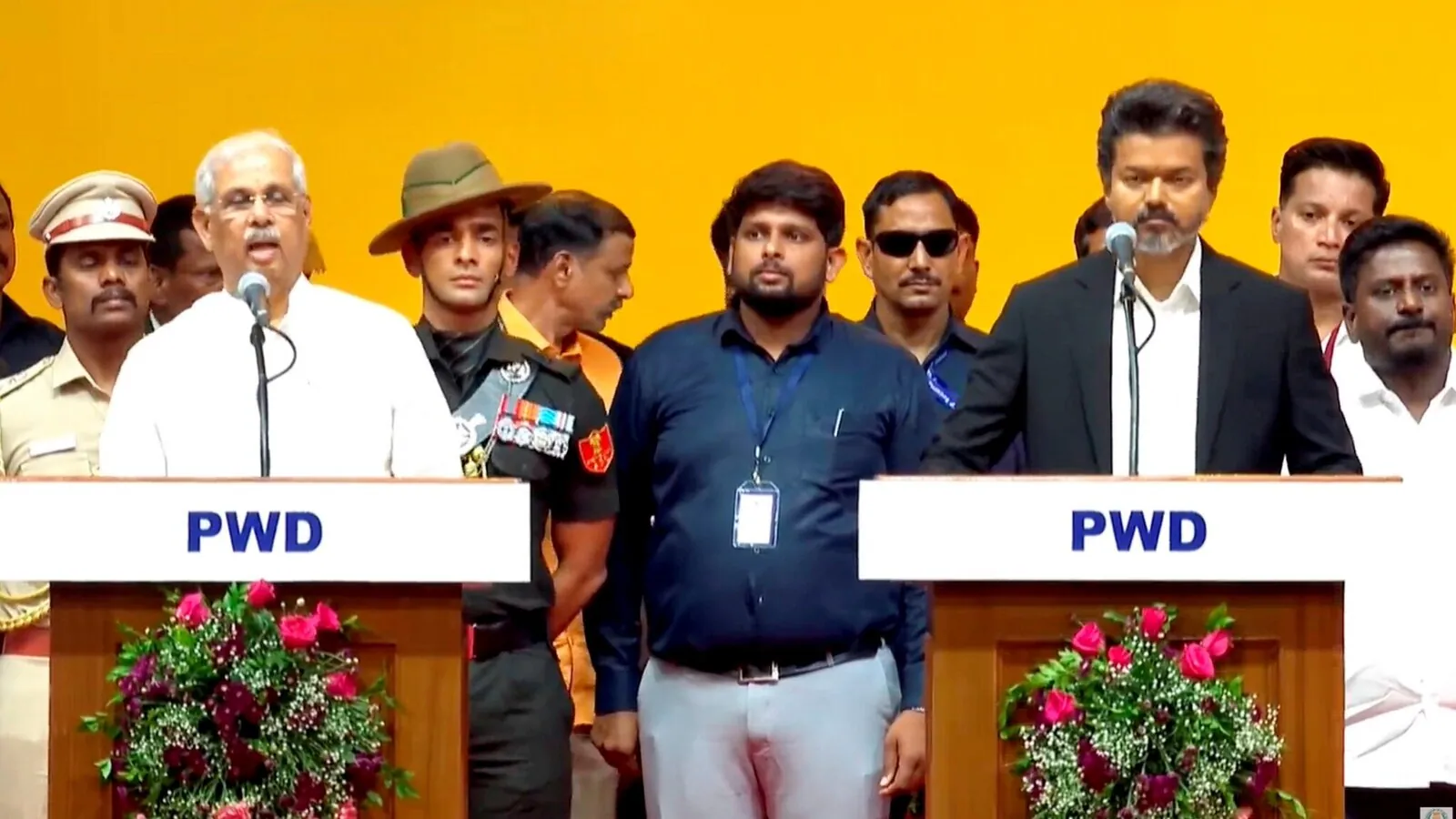 Tamil Nadu Governor Rajendra Arlekar administers the oath of office to C. Joseph Vijay, the TVK leader and chief minister-elect, during his swearing-in ceremony at Jawaharlal Nehru Stadium in Chennai on Sunday.