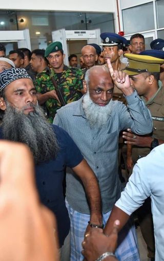 After the Easter Verdict, Two Raised Fingers Stir an Old Fear
