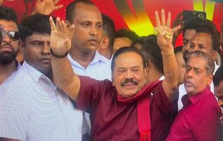 Mahinda Rajapaksa Needed Help to Reach the Stage. He Still Held His Talisman