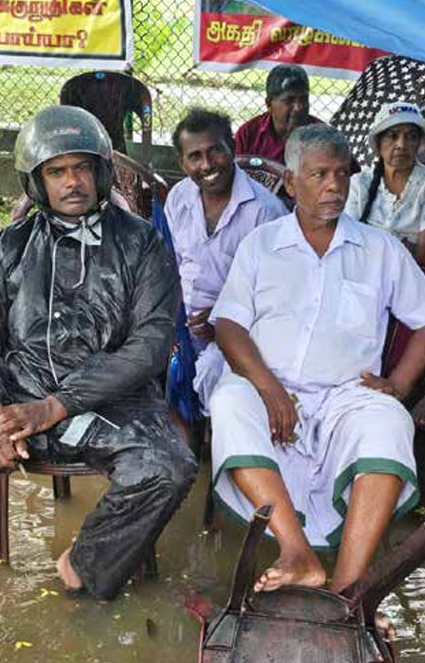 Rain Fails to Deter Tamil Families Protesting Decades-Long Military Occupation of Valikamam North Lands