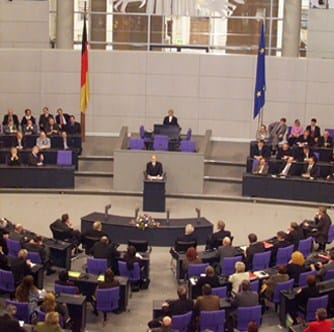 Vladimir Putin speaks from the lectern in the German Bundestag in Berlin in September 2001.