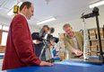 Gary Johnstone of Darlow Smithson Productions  filming Piers Mitchell and Bruno Morgan discussing the 3D model of Richard III’s  spine