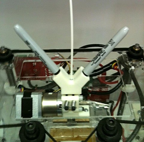 RepRappers have hacked machines to use Sharpie Pens to colour filament