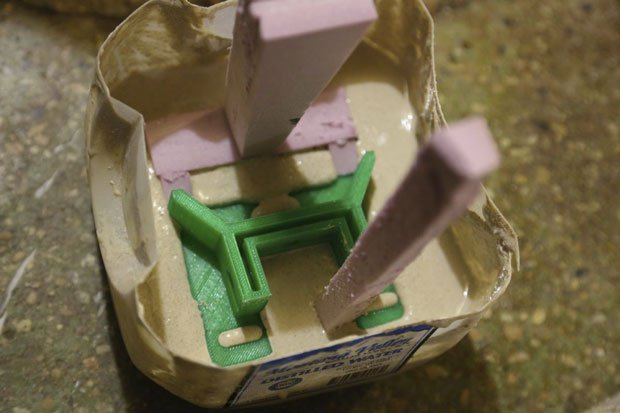 Printed part in a mix of 50% playground sand, 50% plaster of Paris and water.