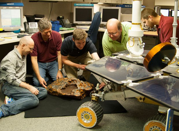 Researchers-and-the-rock.jpg