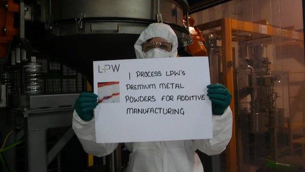 Jan with one of the many machines she operates and maintains.jpg