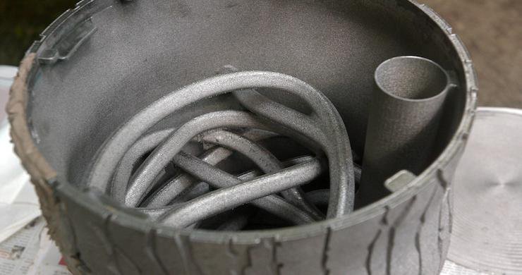 GE Additive 3D printed feeder.jpg