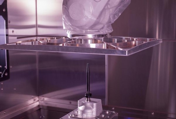 SPEE3D's rocket nozzle and six-axle robotic arm