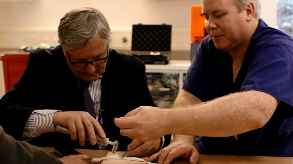 Professor Pepper (l) and Richard Trimlett (r) test an early handheld Professor Pepper (l) and Richard Trimlett (r) test an early handheld