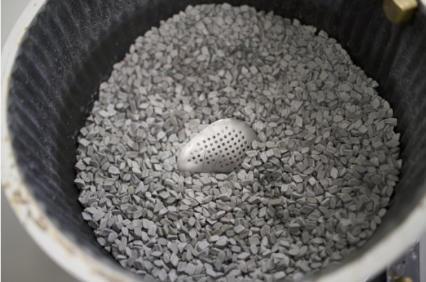 A Renishaw Medical and Dental Implant inside Rosler tumbler