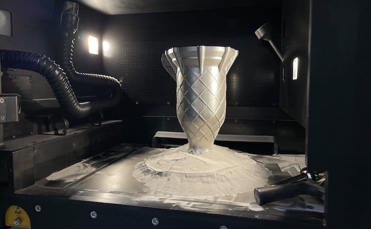 Ultrasonic excitation: A new tool in the industrial depowdering toolbox