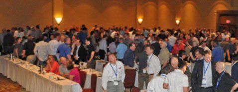 Amug      Attendees mingle prior to a keynote presentation at the 2014 AMUG Conference
