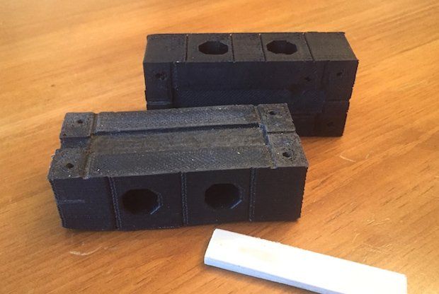 Injection mould for ASTM specification flexural modulus test bars and an injection moulded part madeusing polypropylene.